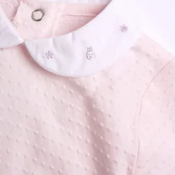 Tutina in tessuto leggero, con apertura sulla schiena ideale per primavera e autunno