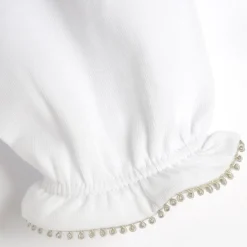 Tutina in tessuto leggero, con apertura sulla schiena ideale per primavera e autunno